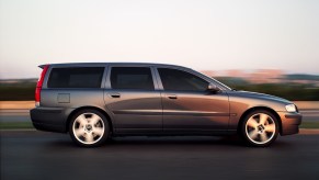 A grey 2003 Volvo V70 driving, one of the most interesting used cars under $1,000