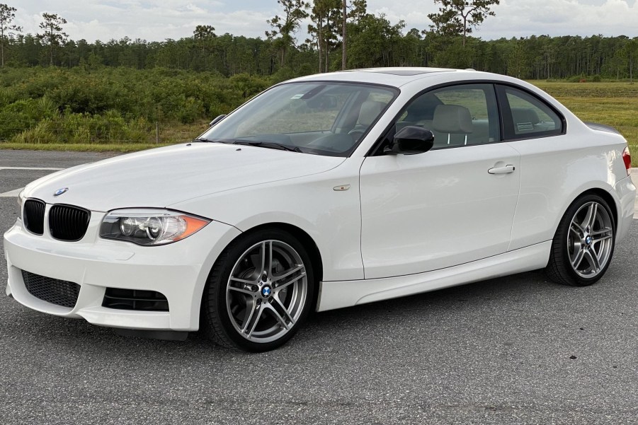 A white 2013 BMW 135is Coupe in a parking lot