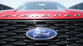 A red Ford Explorer SUV is parked for sale at a dealership on June 12, 2019, in Glendale, California