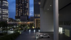 An overhead view of A Nissan Leaf EV charging