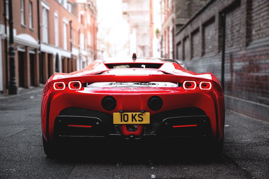 A red Ferrari SF90 Stradale parked in an alley in Mayfair, London, on April 14, 2021