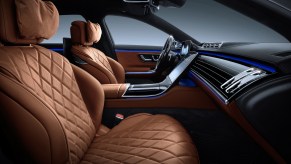 A 2021 Mercedes-Benz S-Class sedan's sienna-brown leather front seats with perforations for ventilation