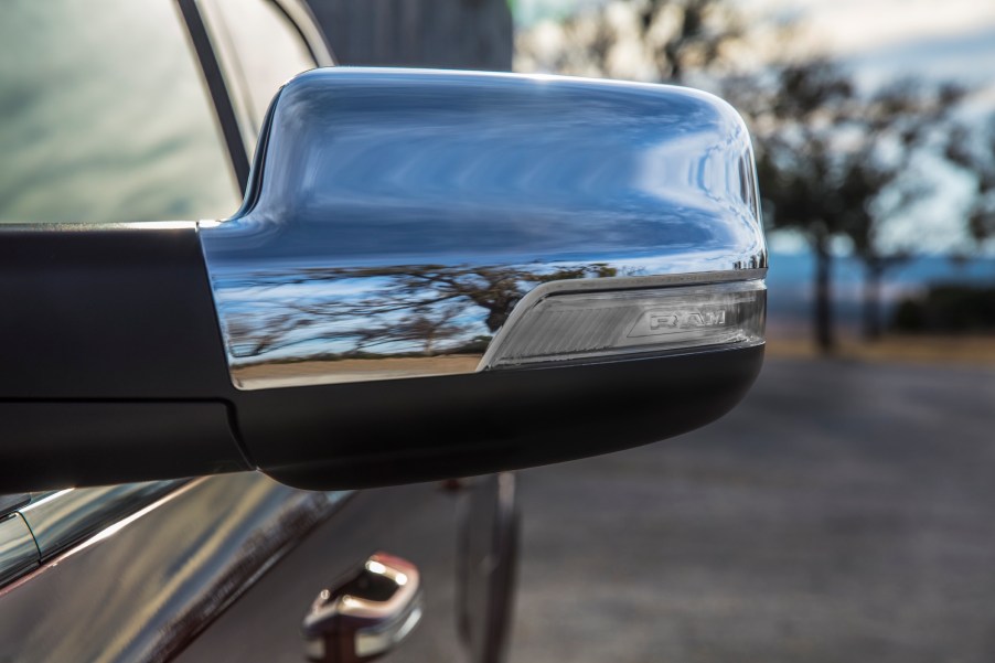 The driver's side mirror of a 2021 Ram 1500 Limited full-size pickup truck