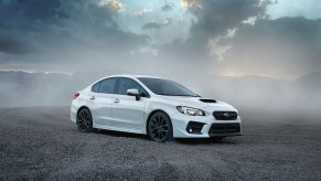 A white 2021 Subaru WRX parked, the 2021 Subaru WRX is one of the fastest new cars under $40,000