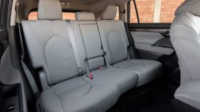 The gray-leather 3rd-row seating of a 2021 Toyota Highlander Platinum midsize SUV