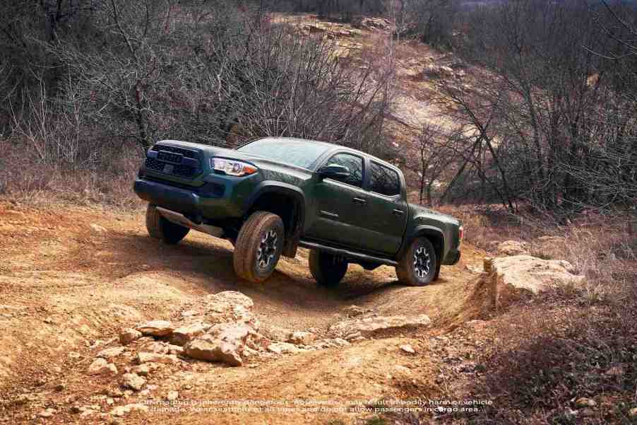 The 2021 Toyota Tacoma going off-roading, the Tacoma TRD Pro is one of the best new off-road pickups according to Edmunds