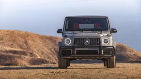 a 2021 Mercedes G-Class sitting on top of a mountain. This model is now the fastest-selling car in America