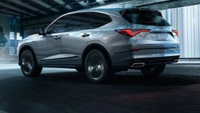 A silver 2022 Acura MDX in a parking garage.