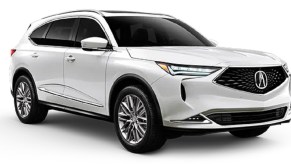 A white 2022 Acura MDX against a white background.