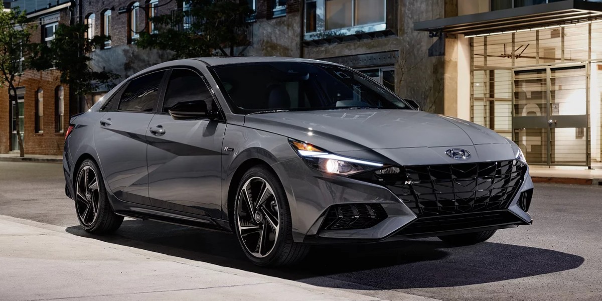 A gray 2022 Hyundai Elantra N is parked.