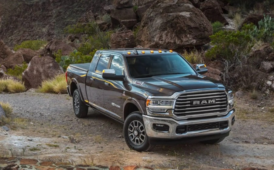 A black 2021 Ram 2500 parked on a gravel road