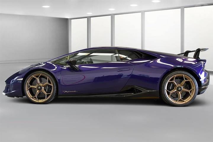 An image of a purple Lamborghini Huracan Performante held for auction.