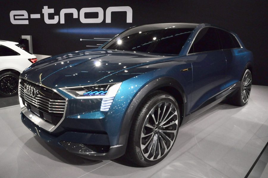 A blue Audi E=Tron EV on display