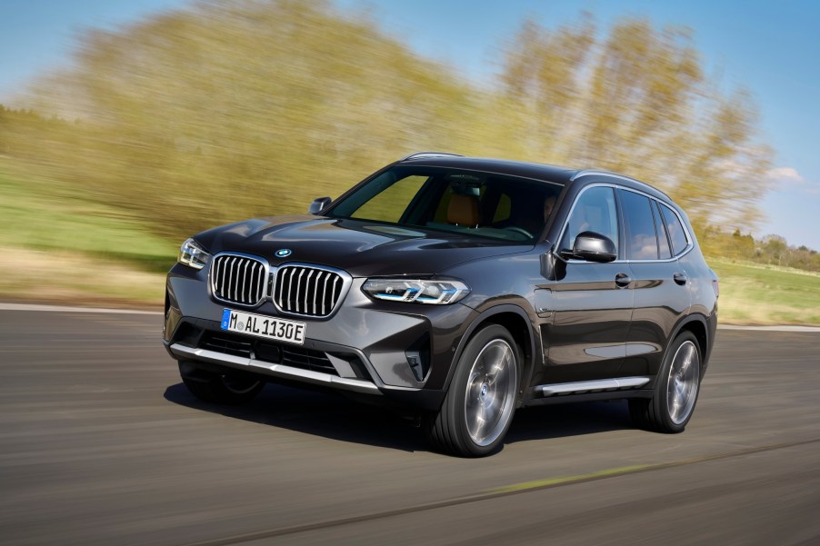 The 2021 BMW X3 driving down a country road