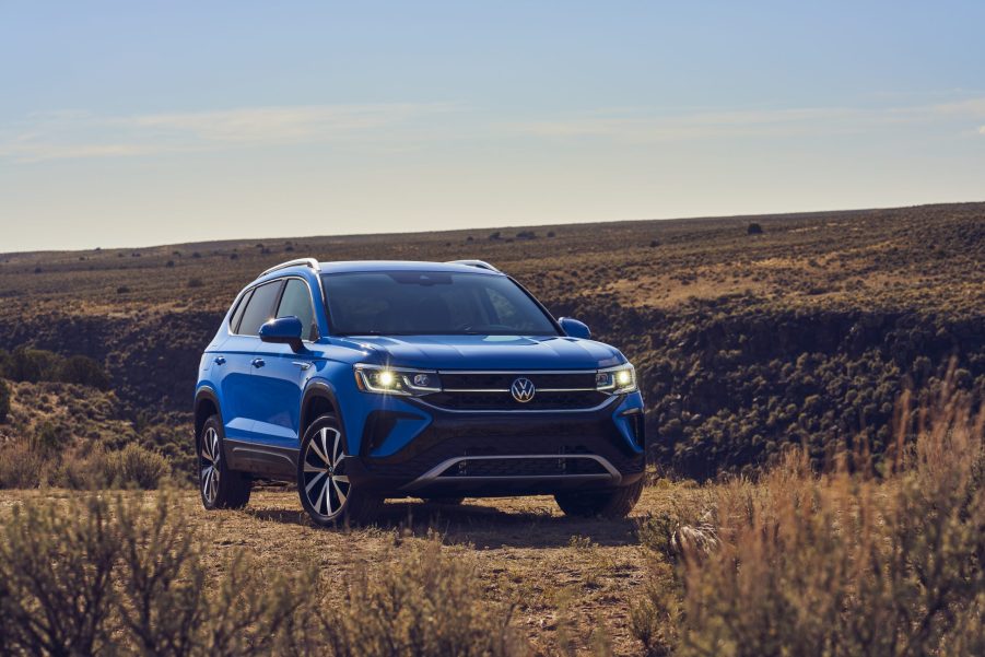 The blue 2022 Volkswagen Taos parked in the desert