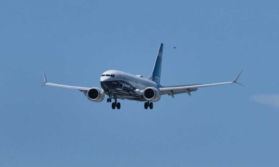 A Boeing 737 MAX airplane lands following an FAA recertification flight at Boeing Field in Seattle in June 2020