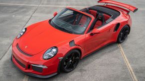 An image of a Porsche 911 GT3 RS Convertible build parked outdoors.