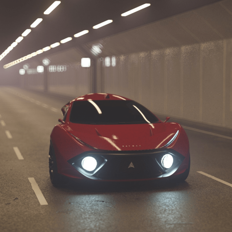 A red Daymak EV in a tunnel