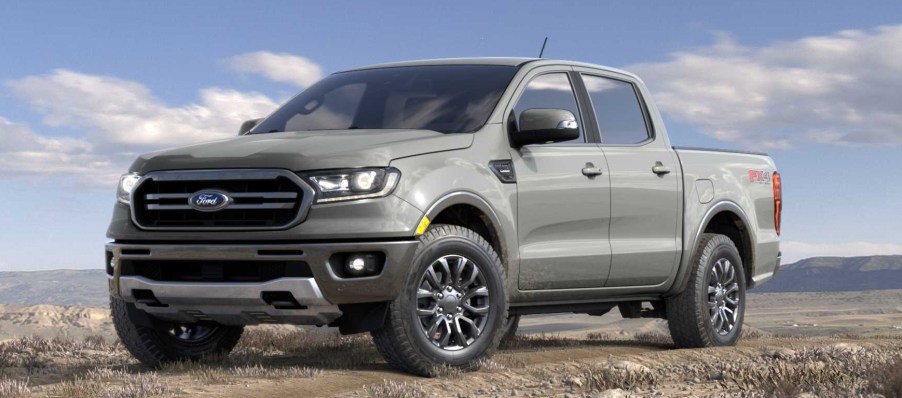 The grey 2021 Ford Ranger pickup truck sitting in a field