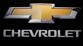 The gold Chevrolet logo and text on a black background