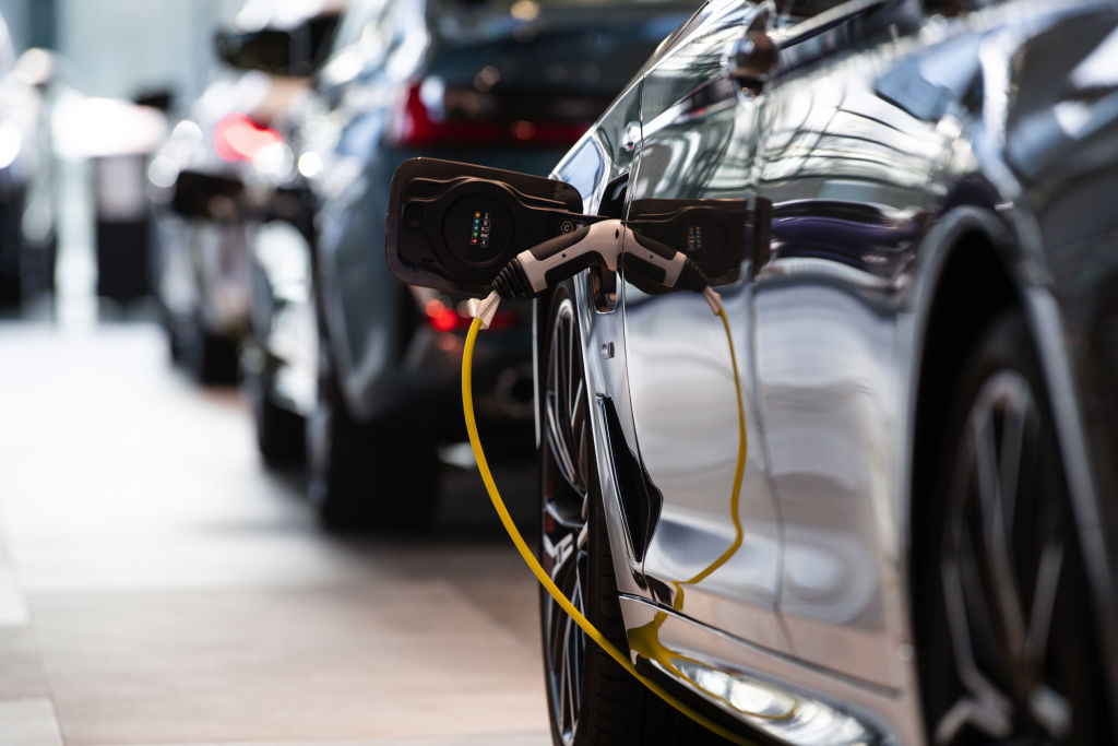 A BMW EV charges at the factory