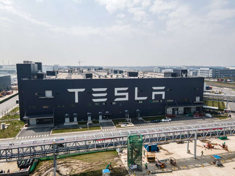 Tesla's factory in Shanghai with the brand's logo painted on the side