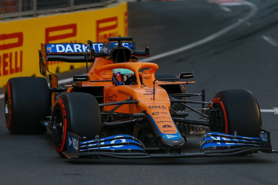 Daniel Ricciardo's orange Formula 1 car on track