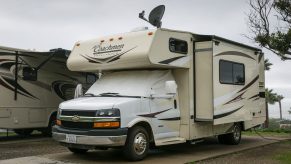 a Chevy Coachmen freelander parked at an rv park