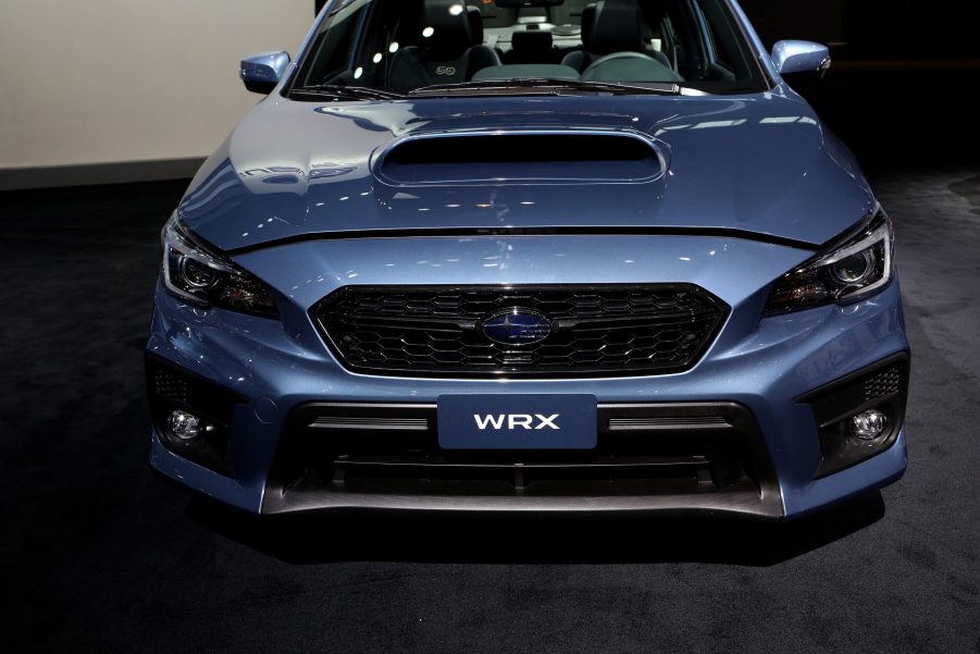 A silver Subaru Impreza WRX at an auto show