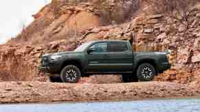 A green 2021 Toyota Tacoma, one of the best affordable new pickups under $30,000