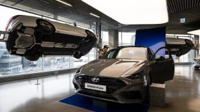 A customer looks at a gray Hyundai Motor Co. Sonata N Line sedan at the company's Motorstudio showroom in Seoul, South Korea