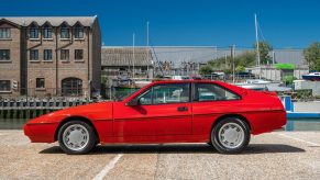 a red Lotus Excel from 1984. These are an obscure vintage European sports car