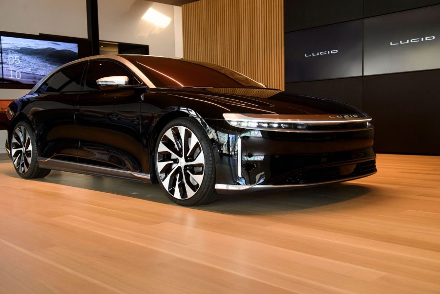 A black Lucid Air Grand Touring electric luxury car is displayed at the Lucid Motors Inc. studio and service center