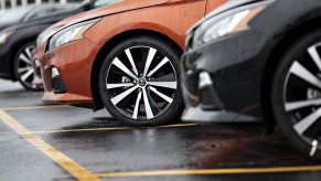 Nissan Altima vehicles sit on the lot at a car dealership in Joliet, Illinois, U.S.