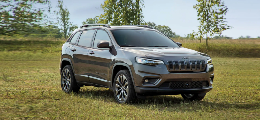 The 2021 Jeep Cherokee parked in grass