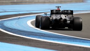 The rear view of Lewis Hamilton's Mercedes F1 car and its rear wing at 2021 French Grand Prix testing