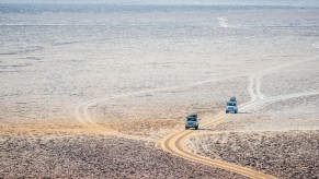 A group of Toyota Land Cruiser SUVs