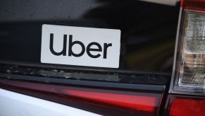 An Uber sticker on a white car on August 20, 2020, in Los Angeles, California