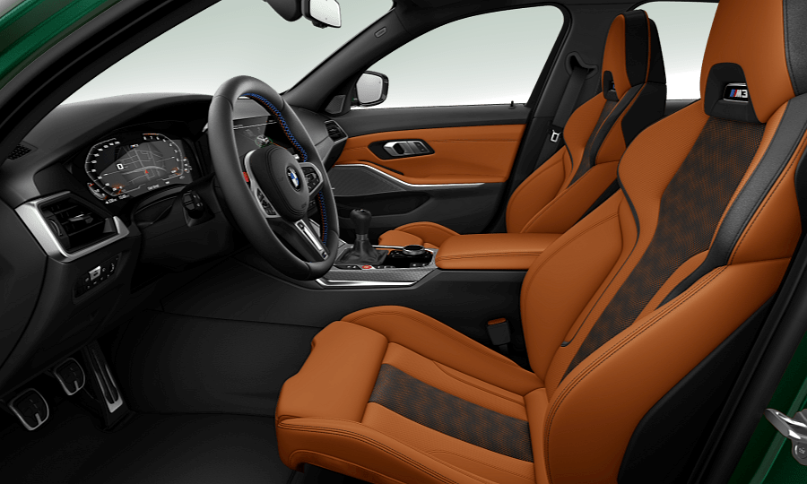 The Kyalami Orange interior of the M3 with manual transmission