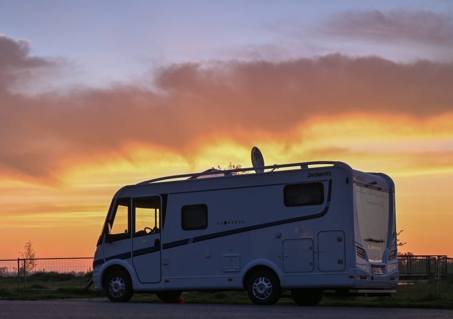 A camper van at sunrise