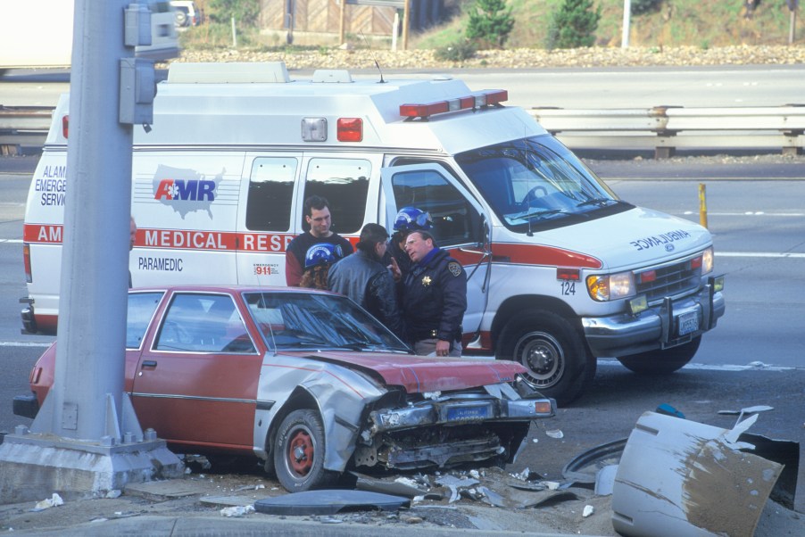 A highway patrolman at a car carsh in California