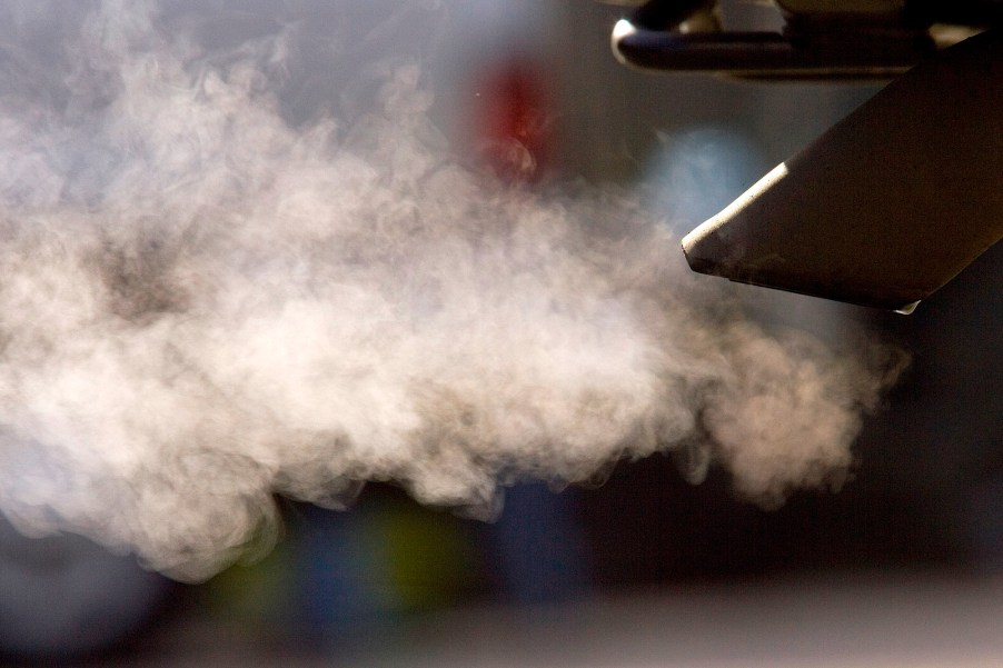 Exhaust billows out of a car tailpipe on January 2, 2008, in San Francisco, California