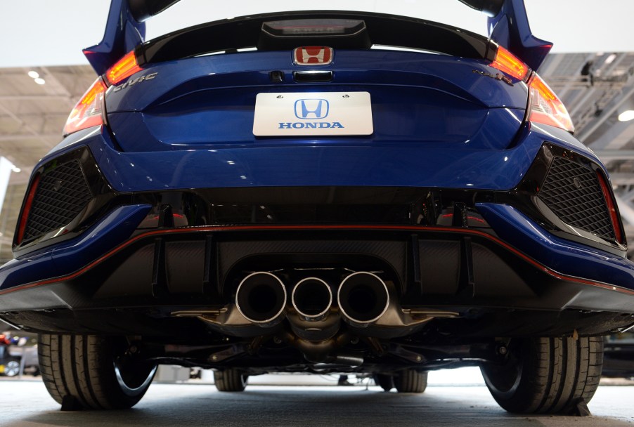 The triple exhaust pipes of the Honda Civic Type R