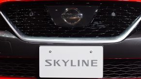 The grille of a red Nissan Skyline