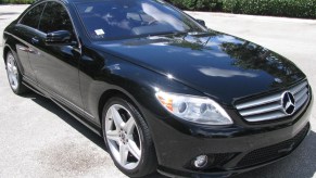 A black 2010 Mercedes-Benz CL550 4Matic in a parking lot