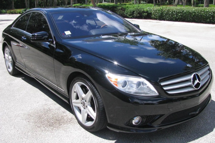 A black 2010 Mercedes-Benz CL550 4Matic in a parking lot