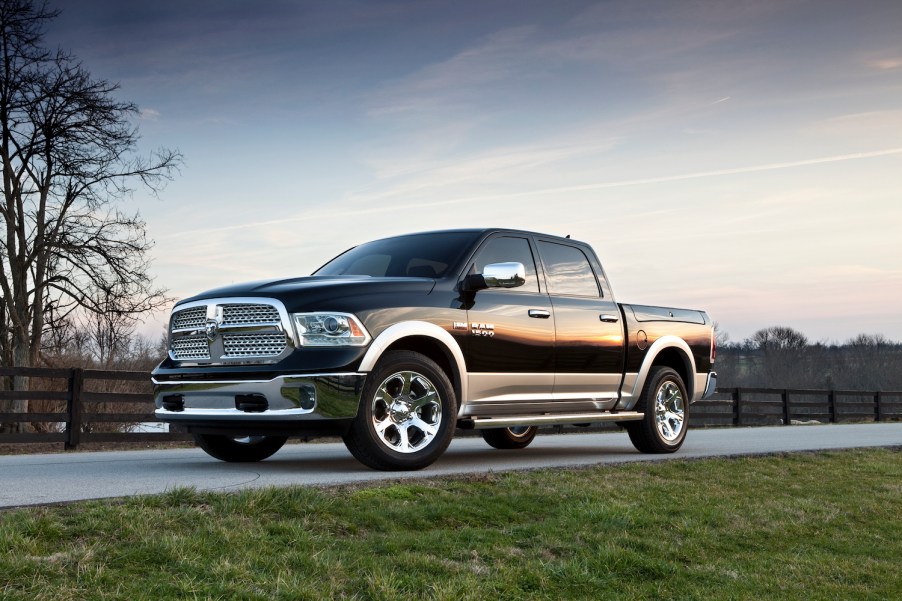 A 2013 Ram 1500 parked near a patch of grass, the 2013 Ram 1500 is one of the best used full-size trucks under $20,000