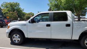 A white Ford F-150 pickup truck