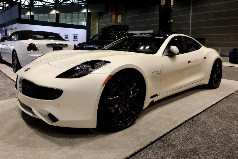 A white Karma Revero sports sedan on display at the Chicago Auto Show at McCormick Place on February 7, 2019