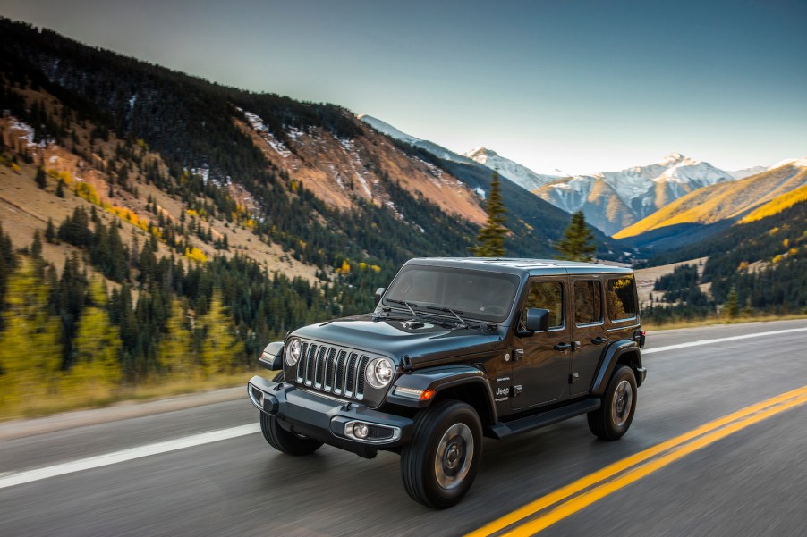 A grey 2020 Jeep® Wrangler Sahara driving, the Wrangler is one of the best used cars of 2021